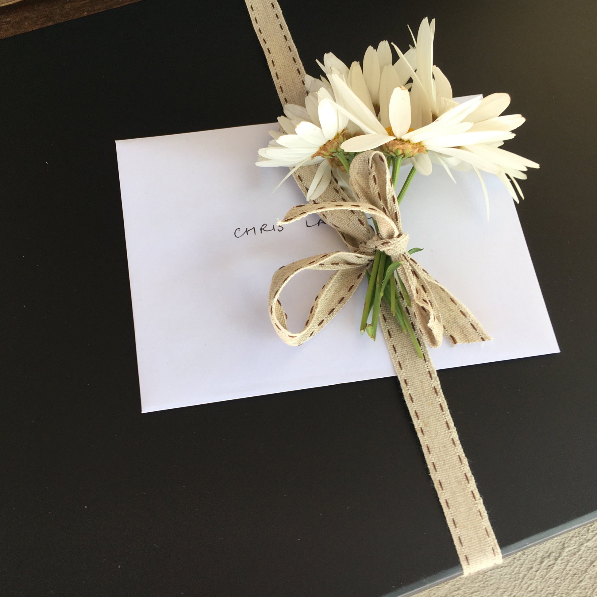 Gift Box presented with fresh flowers adn complimentary card