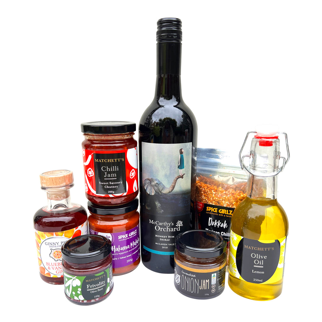 Welcome home or congratulations gift box with shiraz, ginny pig gin, olive oil and condiments
