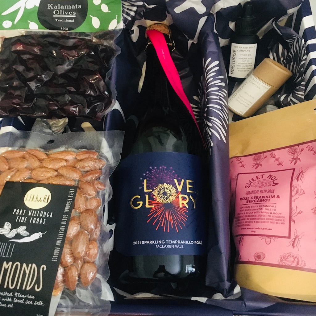 Low Sugar sparkling rosé, olives and almonds, bath salts and organic facial oil and deodorant from teh Barossa